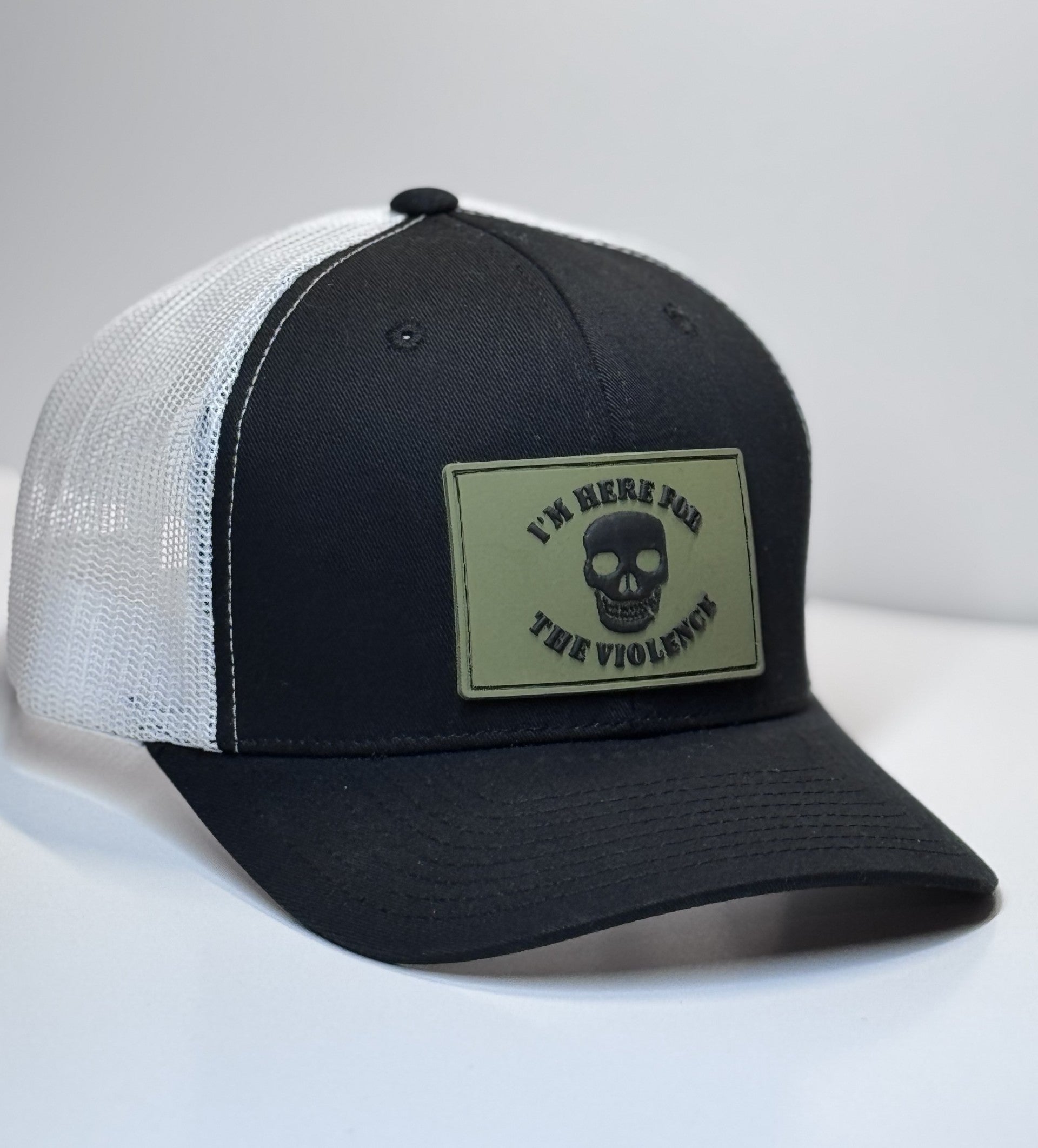 HAT BLACK ON WHITE MESH HERE FOR THE VIOLENCE