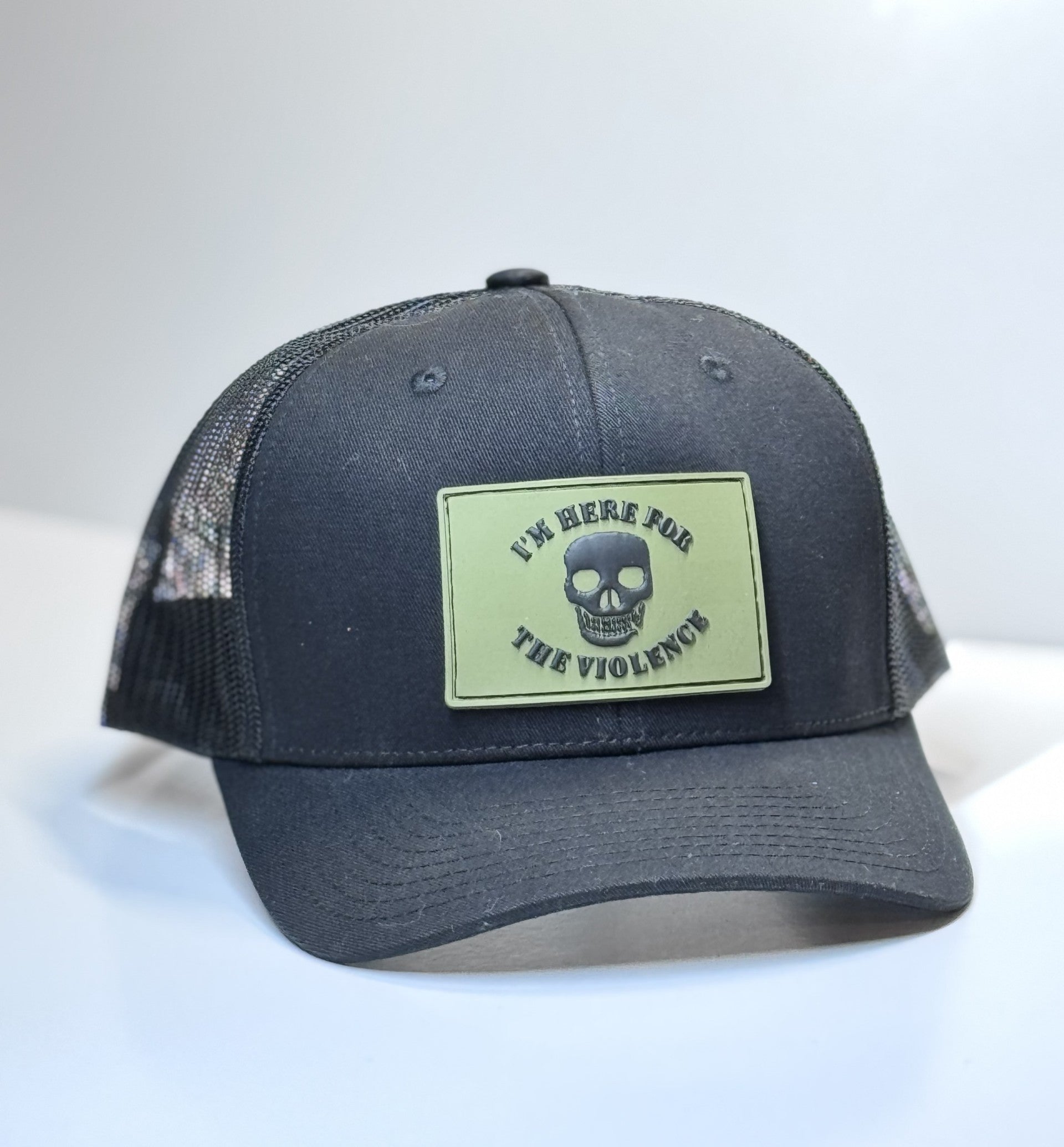 HAT BLACK ON BLACK MESH HERE FOR THE VIOLENCE