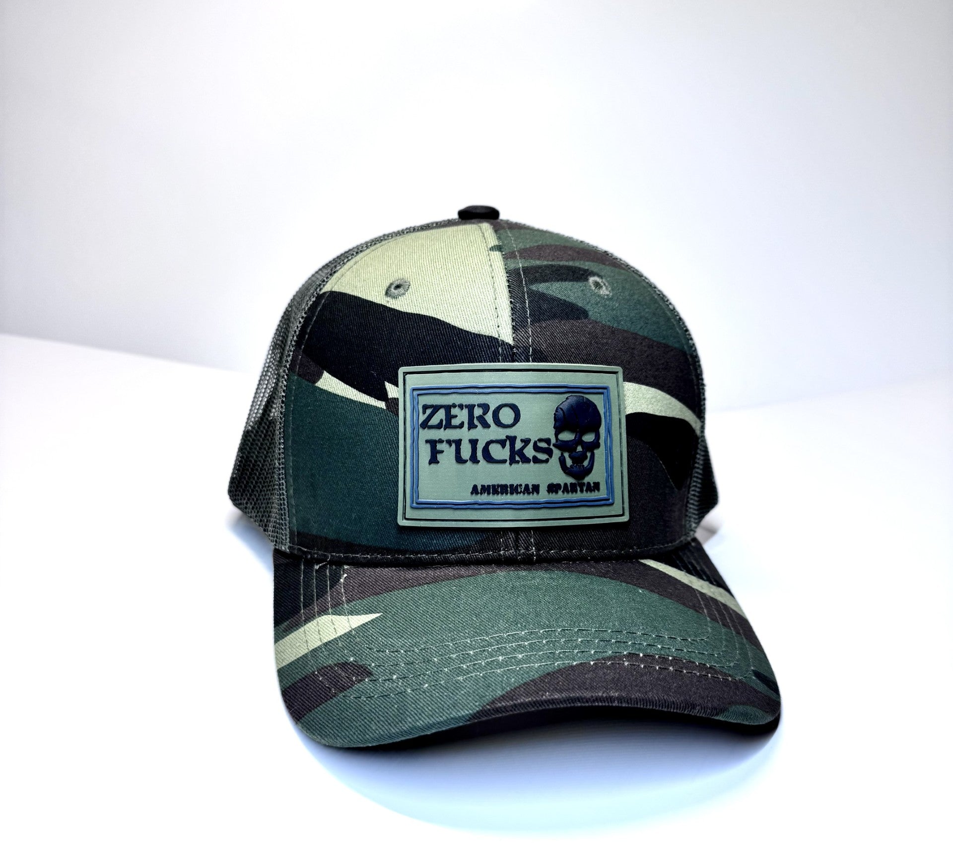 HAT WOODLAND ON GREEN MESH ZERO FUCKS