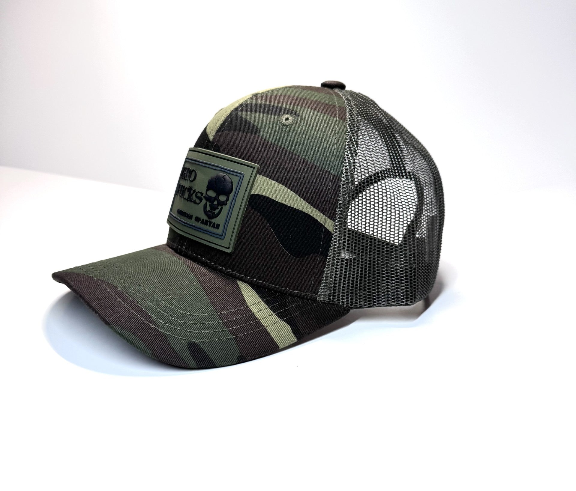 HAT WOODLAND ON GREEN MESH ZERO FUCKS